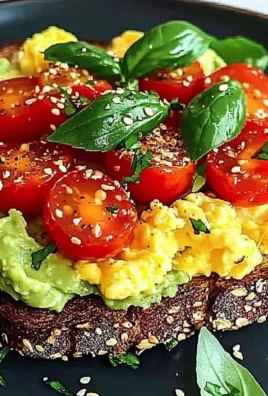 Avocado Toast with Scrambled Eggs and Tomatoes