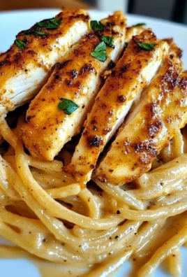 Savory Cajun Chicken over Creamy Parmesan Linguine