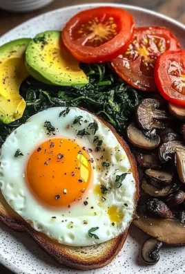 Sunny Eggs with Sauted Spinach, Mushrooms & Avocado Toast