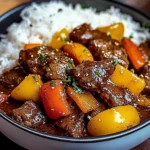 Black Pepper Beef Stir-Fry with Rainbow Peppers and Sesame Finish