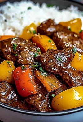 Black Pepper Beef Stir-Fry with Rainbow Peppers and Sesame Finish