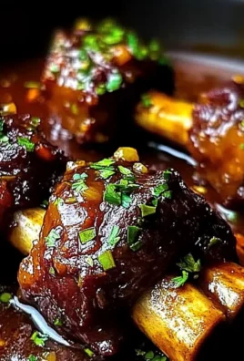 Braised Lamb Shanks in Red Wine and Herb Sauce