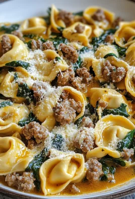 Garlic Butter Tortellini in Creamy Sauce with Beef, Italian Sausage & Spinach